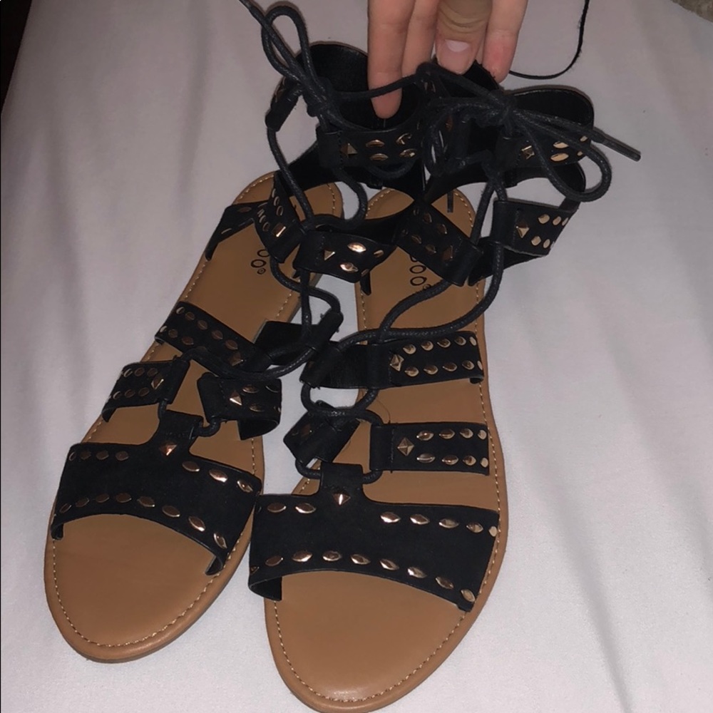 Bamboo Black and gold gladiator sandals!